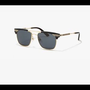 Gucci black and gold sunglasss
